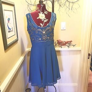 Beautiful teal dress with gorgeous beadwork.